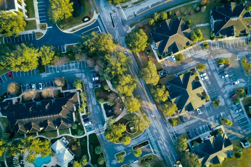 Aerial view of Lake Mary, FL, featuring residential streets surrounded by lush greenery.